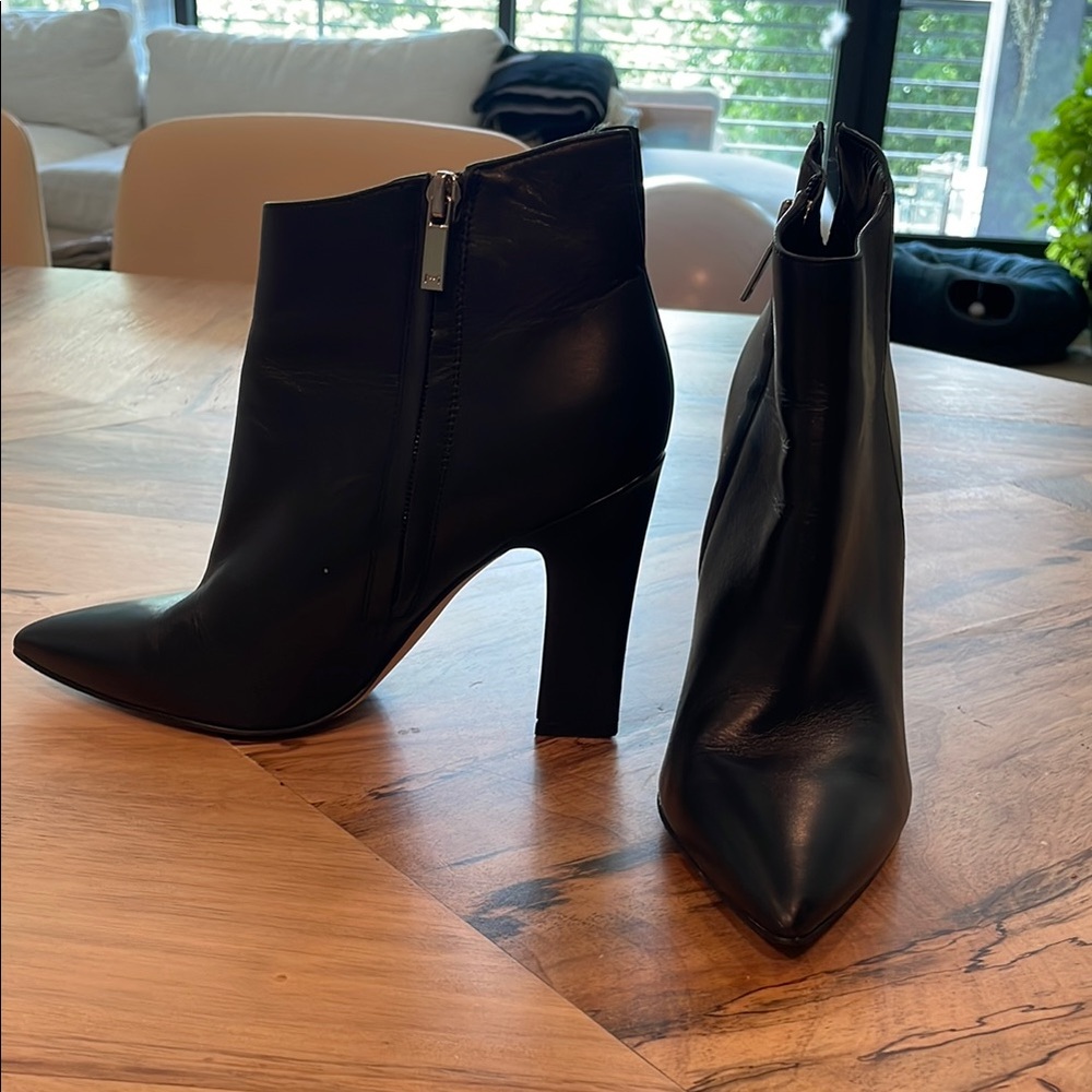 Marc Fisher Black Heeled Boots with Modern Silhouette